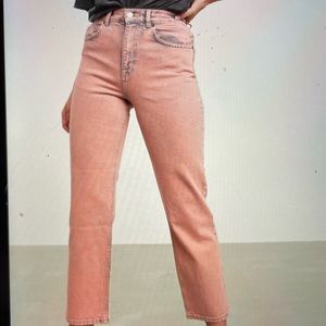 ASOS Design high rise slim straight leg jeans in overdye pink